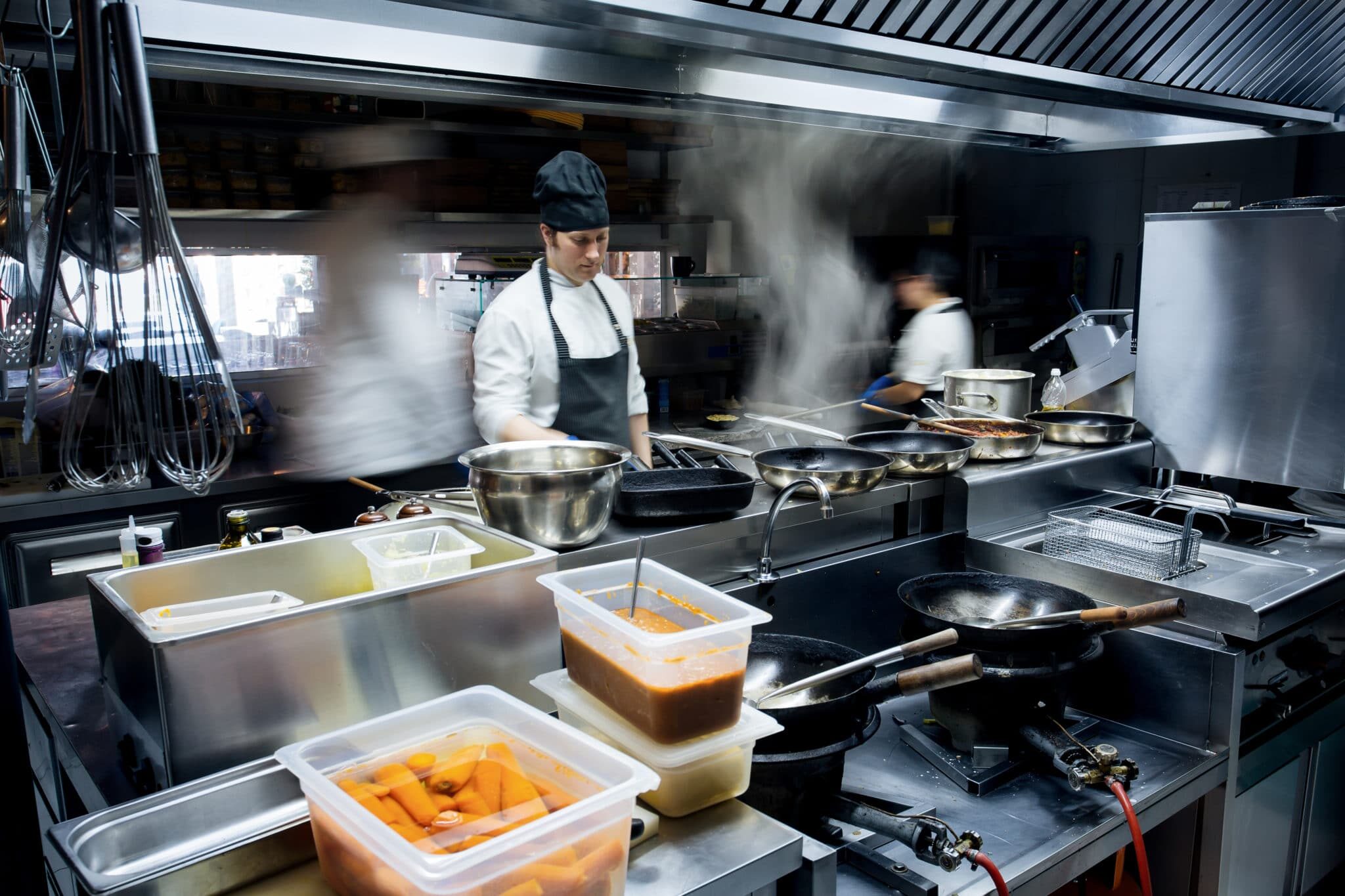 bigstock-motion-chefs-of-a-restaurant-n-242540407