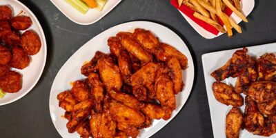 Wing Boss recherche le troupeau pour le premier restaurant de brique et de mortier à Addison