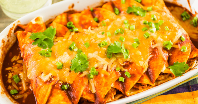 Chicken enchiladas smothered with cheese