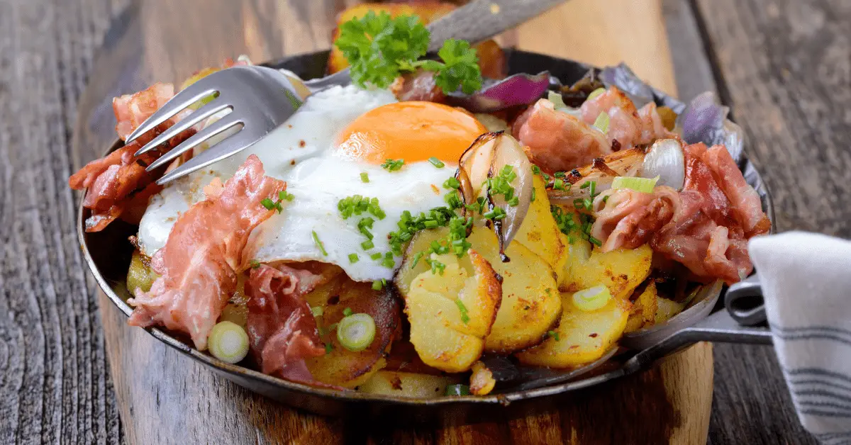 German Farmers Breakfast: Egg, Potatoes, Bacoon and Onions