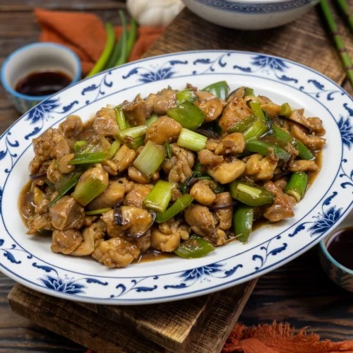 Poulet aux oignons nouveaux et gingembre.