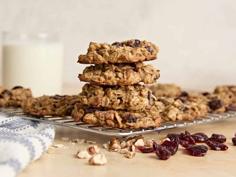Side view of a stack of breakfast cookies on a plate.