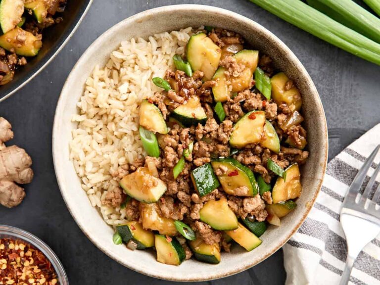 Overhead view of a bowl of ground turkey zucchini skillet dinner with rice.