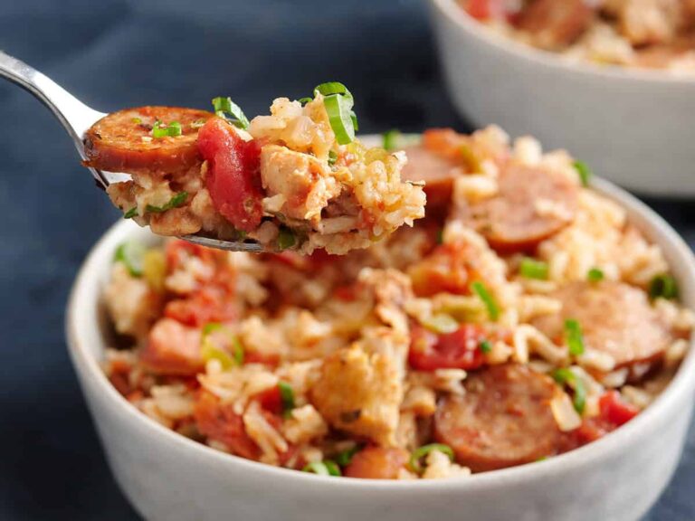a fork taking a bite out of Slow Cooker Jambalaya