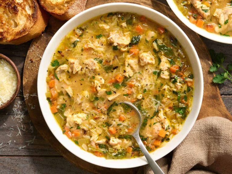 Overhead view of a chicken brothy rice bowl.
